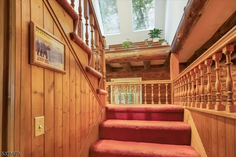 a bed room with a bed and a window