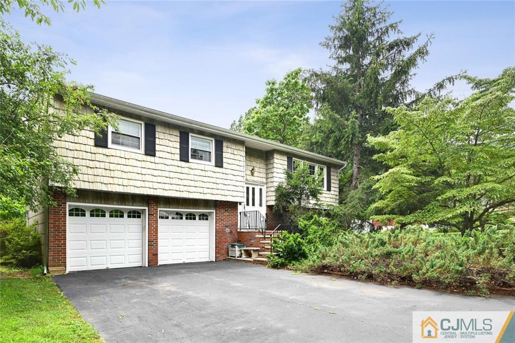 4 Revock Road East Brunswick, NJ 08816 - Photo 1 of 28 front view of a house with a street