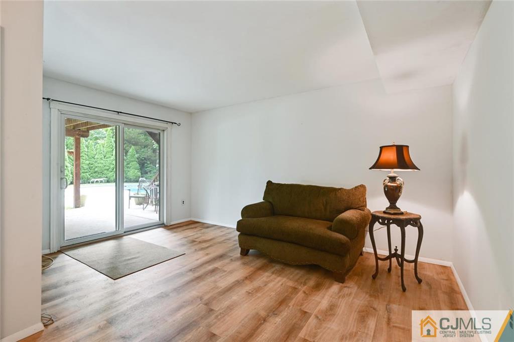 4 Revock Road East Brunswick, NJ 08816 - Photo 22 of 28 a living room with furniture and a window