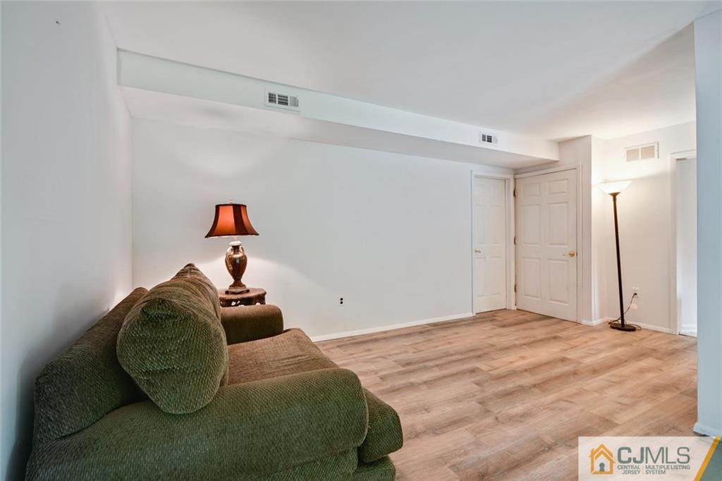 4 Revock Road East Brunswick, NJ 08816 - Photo 23 of 28 a bedroom with a bed and a closet