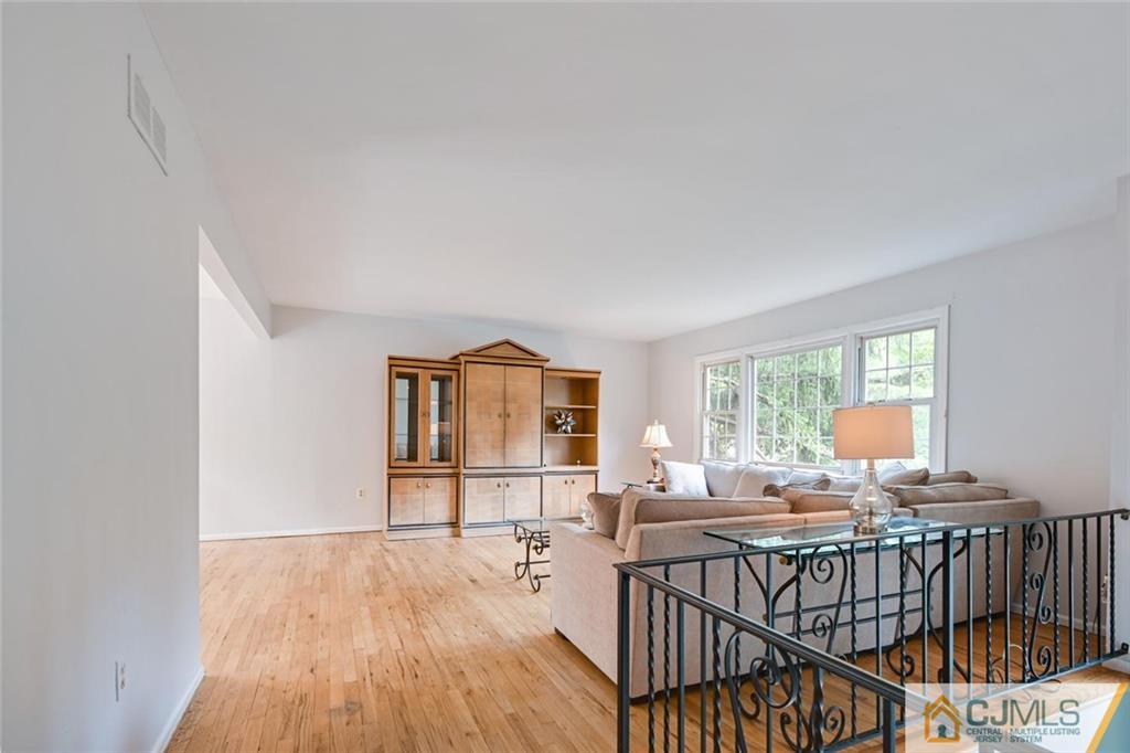 4 Revock Road East Brunswick, NJ 08816 - Photo 7 of 28 a view of a livingroom with furniture window and outside view