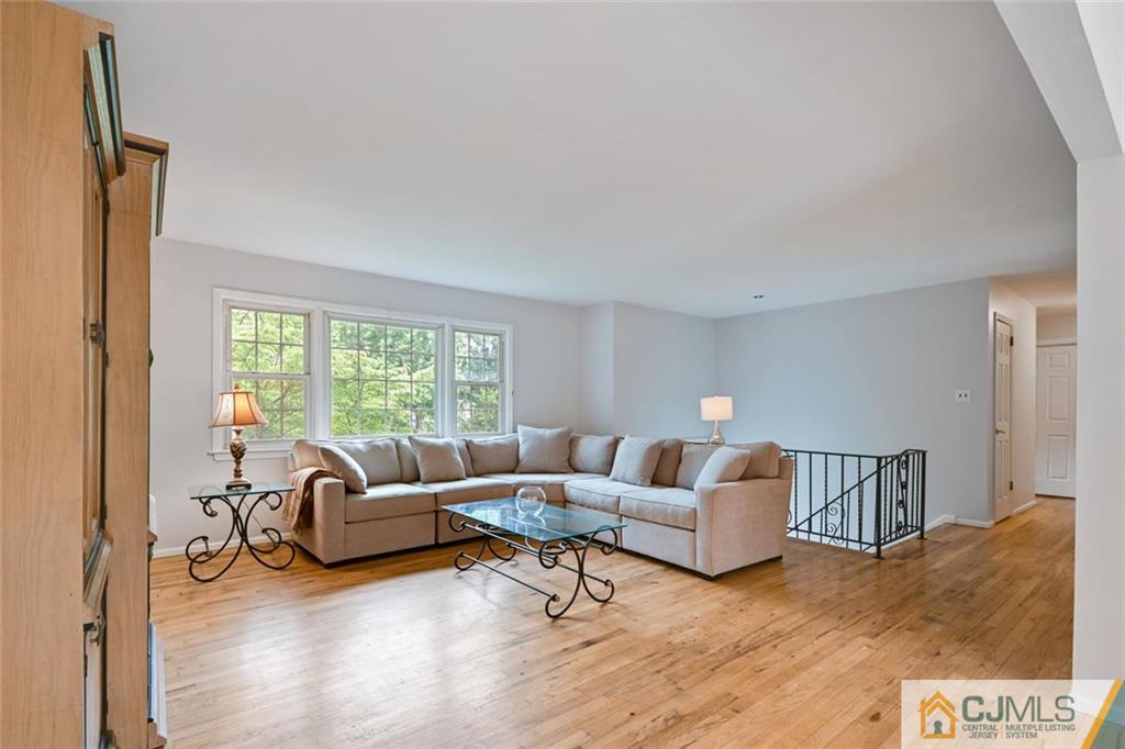 4 Revock Road East Brunswick, NJ 08816 - Photo 8 of 28 a living room with furniture and a large window