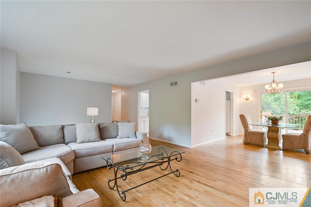 4 Revock Road East Brunswick, NJ 08816 - Photo 10 of 28 a living room with furniture and a large window