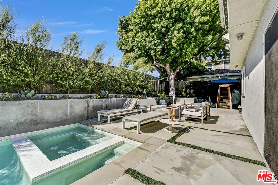5101 Keli Court Los Angeles, CA 90066 - Photo 14 of 29 a view of a patio with couches table and chairs and potted plants