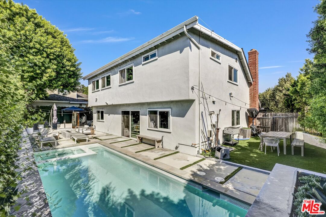 5101 Keli Court Los Angeles, CA 90066 - Photo 15 of 29 a view of a house with pool and chairs