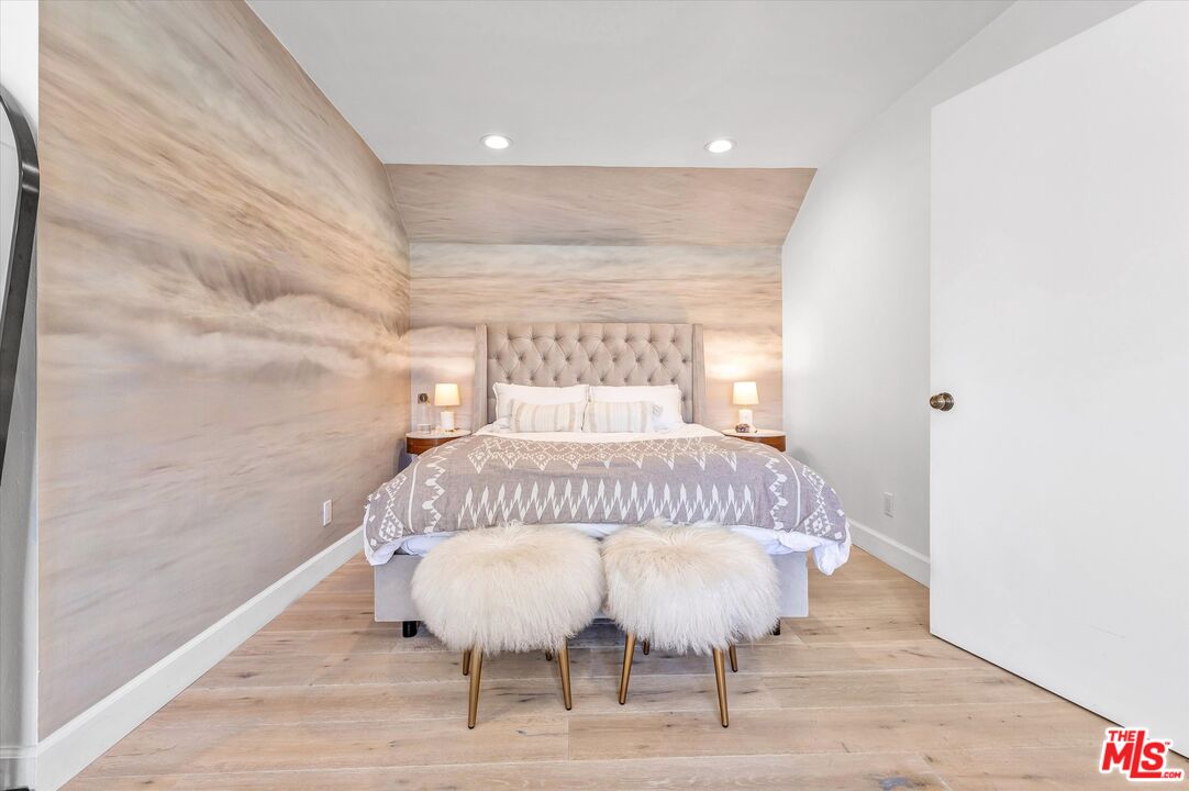 5101 Keli Court Los Angeles, CA 90066 - Photo 21 of 29 a bed sitting in a bedroom next to a window