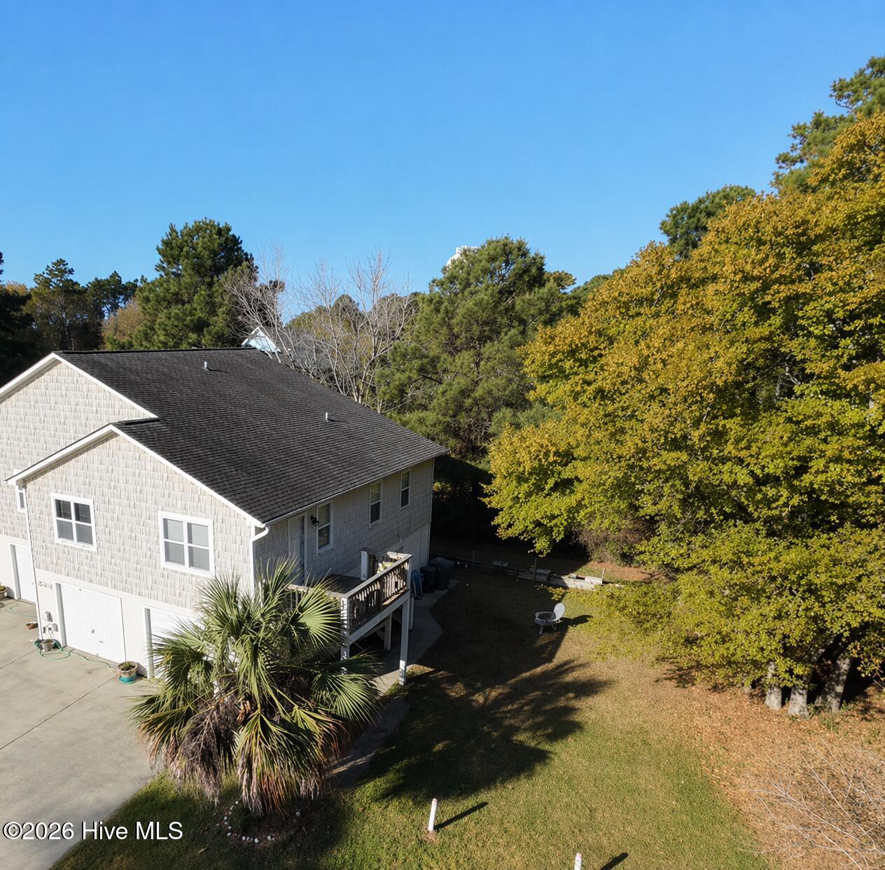 305 Osprey Ridge Drive, Unit NORTH Emerald Isle, NC 28594 - Photo 2 of 3 Large Yard space