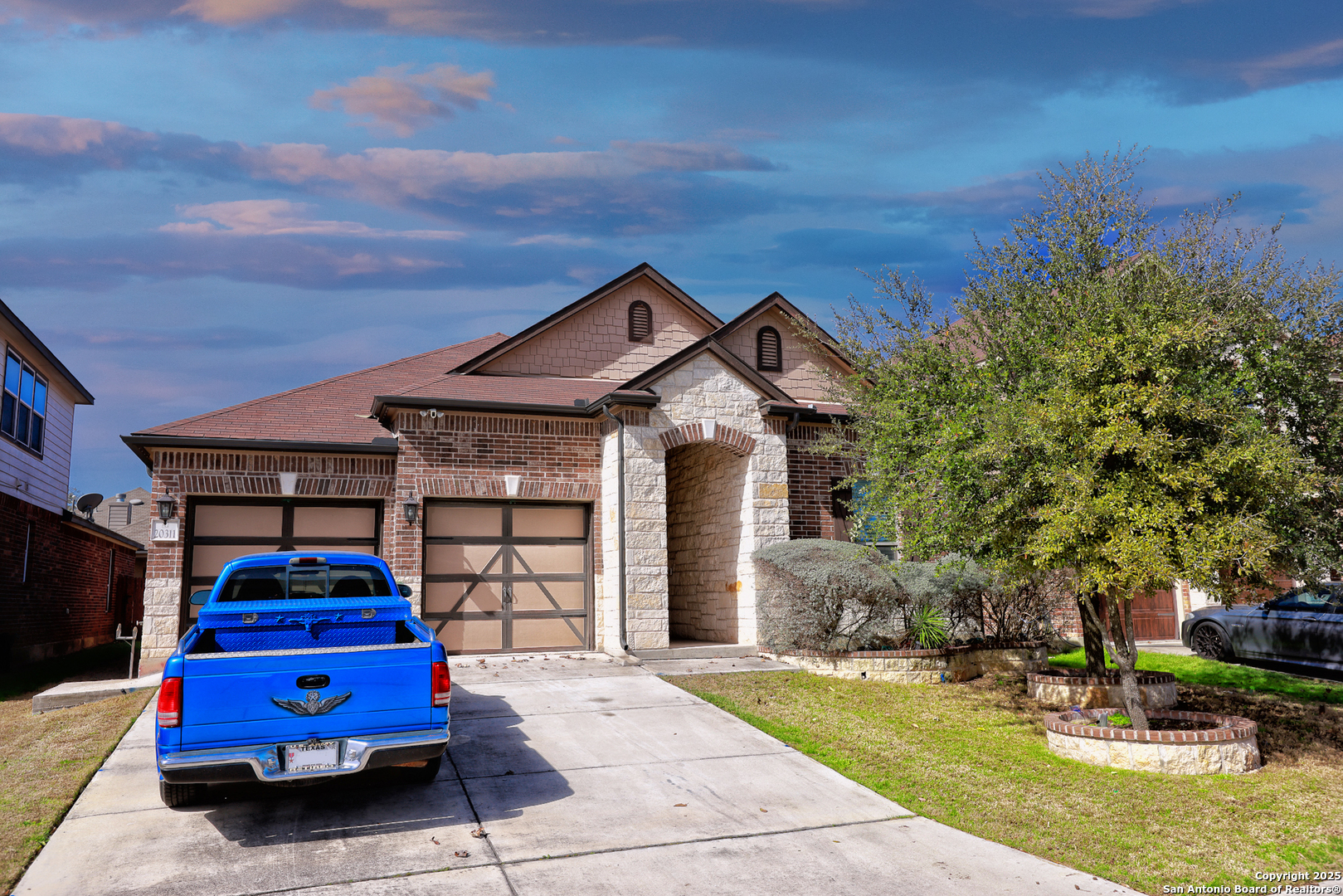 20311 Oak Panache San Antonio, TX 78259 - Photo 1 of 1 a front view of a house with garden
