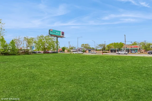 a childrens park with lots of swings and slides