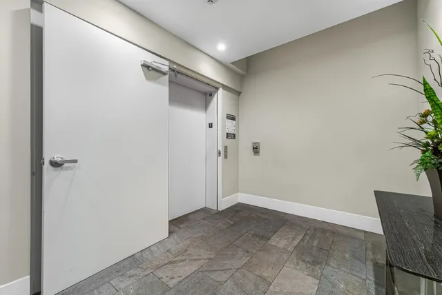 a view of backyard with outdoor seating a patio and a garden