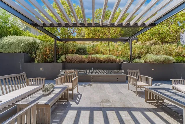 a view of parking garage with cars