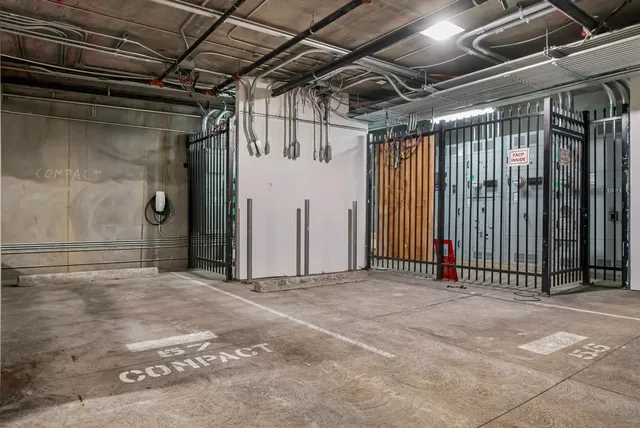 a bathroom with a mirror and a shower
