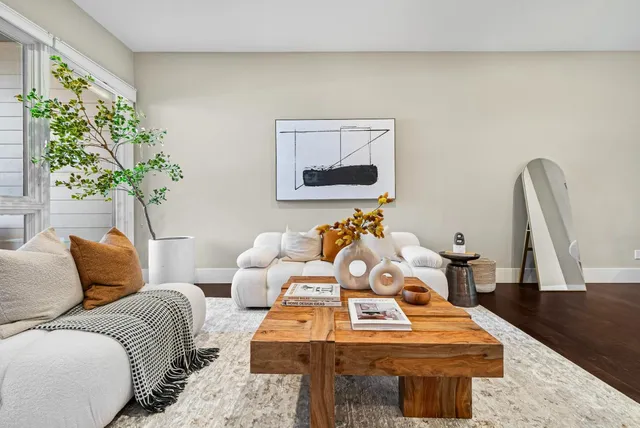 a living room with furniture and a couch