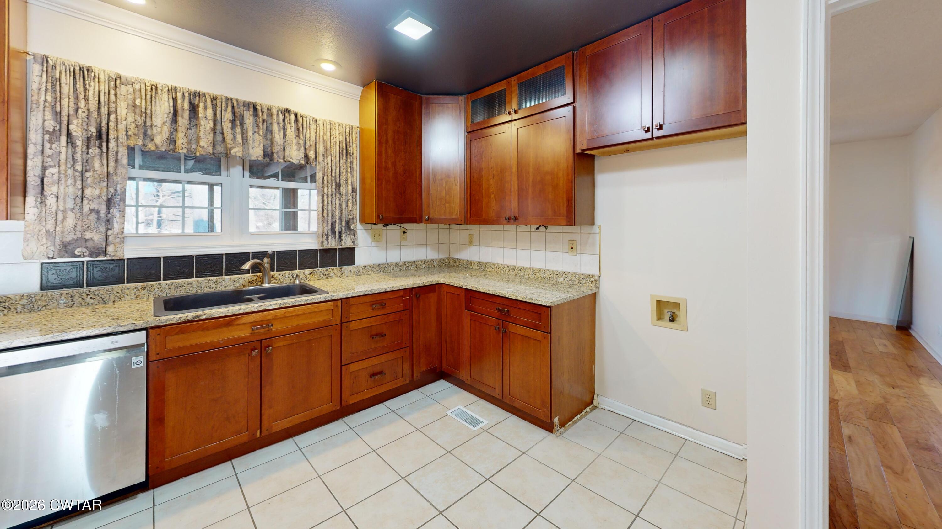 44 Pine Ridge Road Dyersburg, TN 38024 - Photo 27 of 41 44-Pine-Ridge-Cove-Kitchen