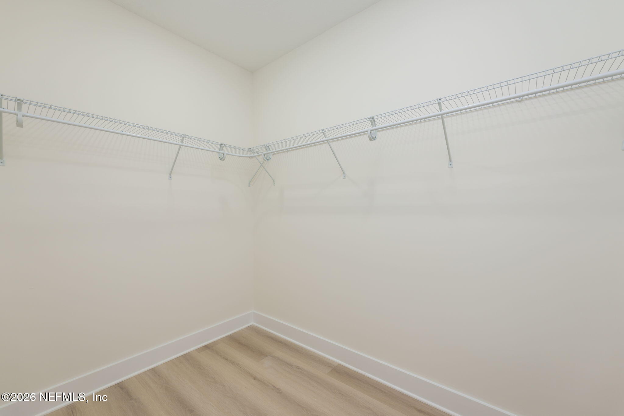 688 Madeore Street St. Augustine, FL 32084 - Photo 16 of 28 a view of a room with racks on the wall