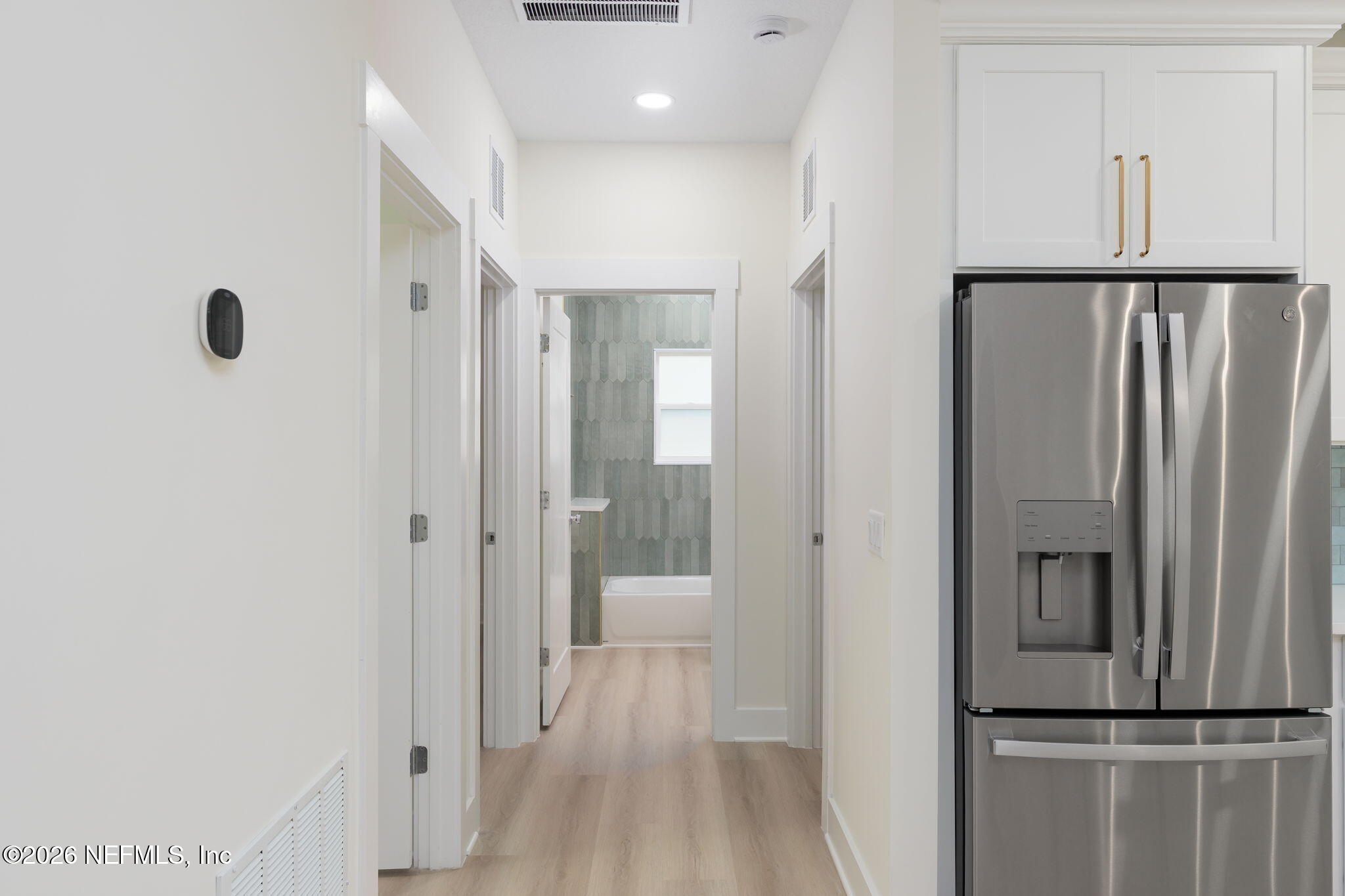 688 Madeore Street St. Augustine, FL 32084 - Photo 17 of 28 a view of a kitchen with a refrigerator and a sink