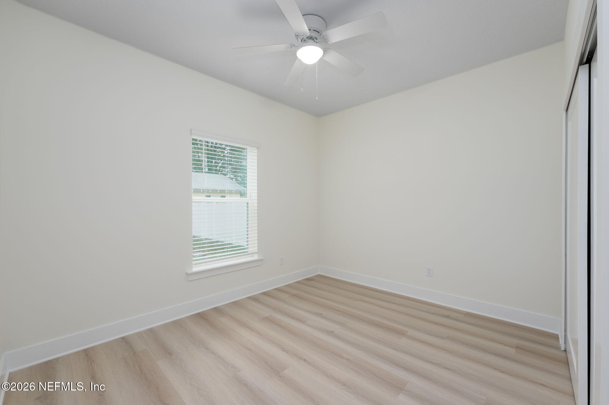 688 Madeore Street St. Augustine, FL 32084 - Photo 22 of 28 an empty room with a window