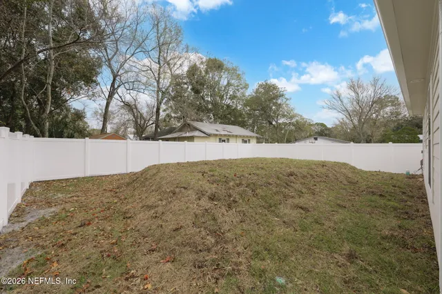 a view of outdoor space and yard