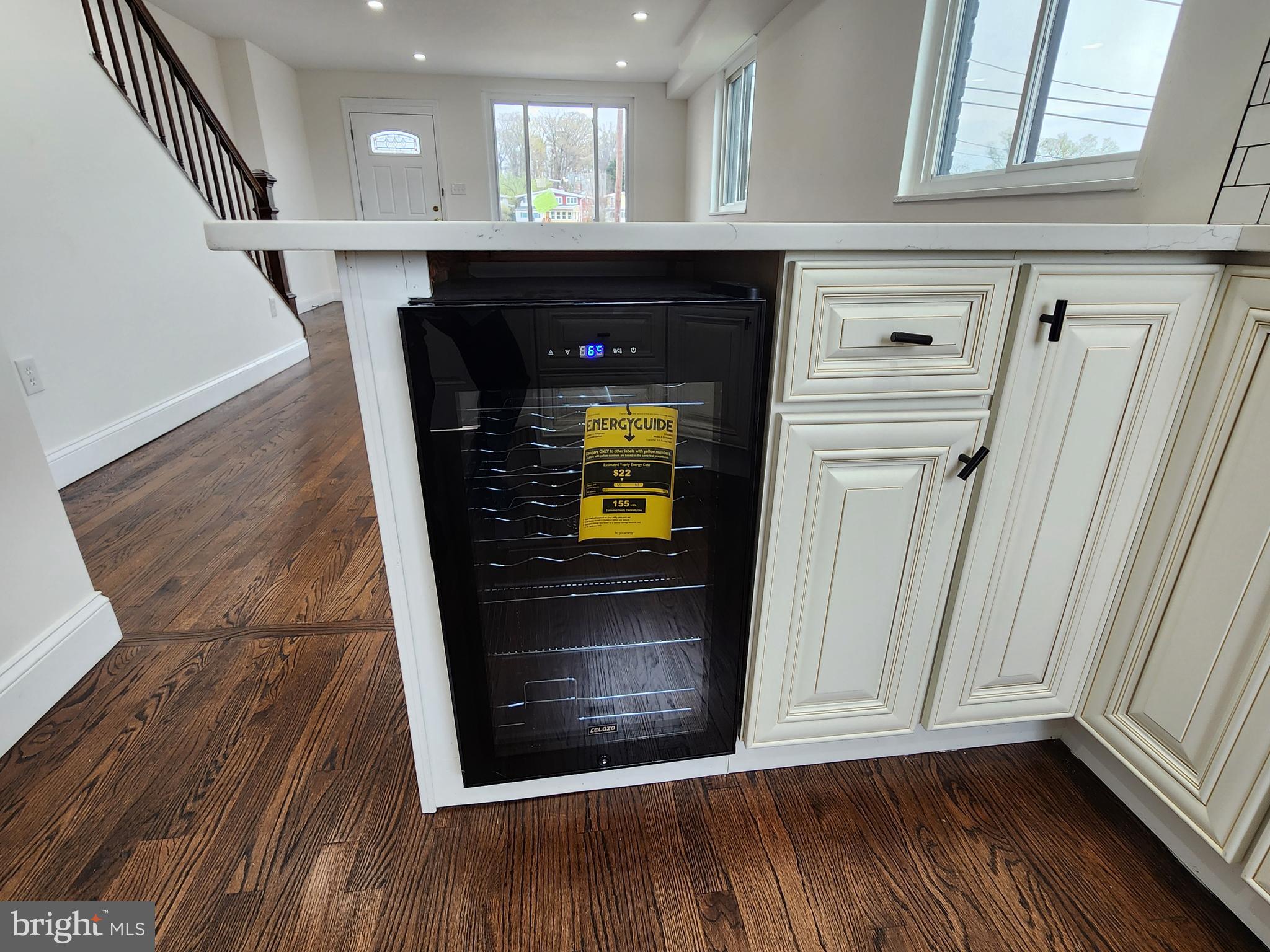 1261 Gallatin Street Northeast Washington, DC 20017 - Photo 17 of 60 a view of a hallway with wooden floor and staircase