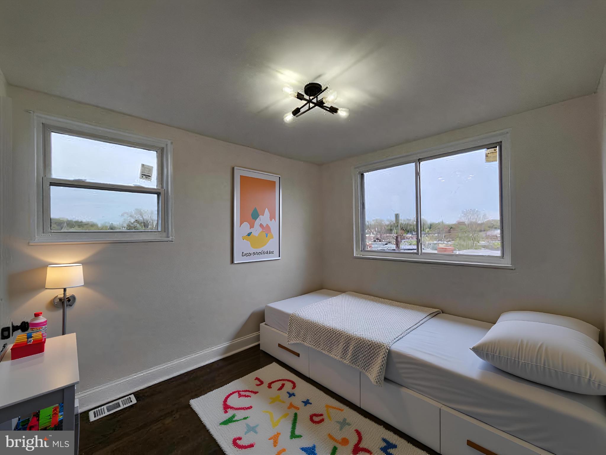 1261 Gallatin Street Northeast Washington, DC 20017 - Photo 24 of 60 a bedroom with furniture and a window
