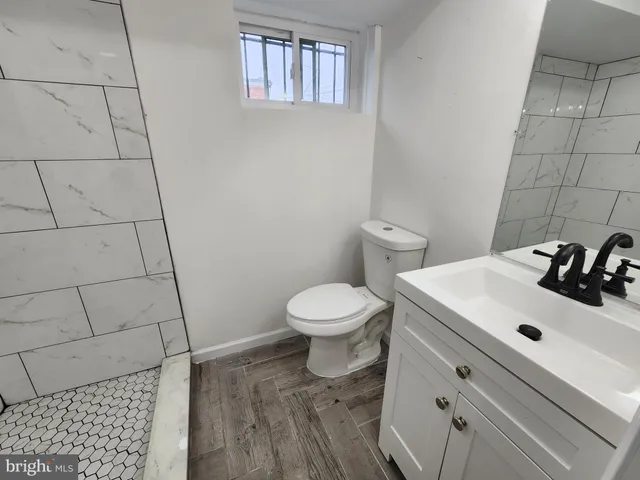 a view of front door of house with stairs