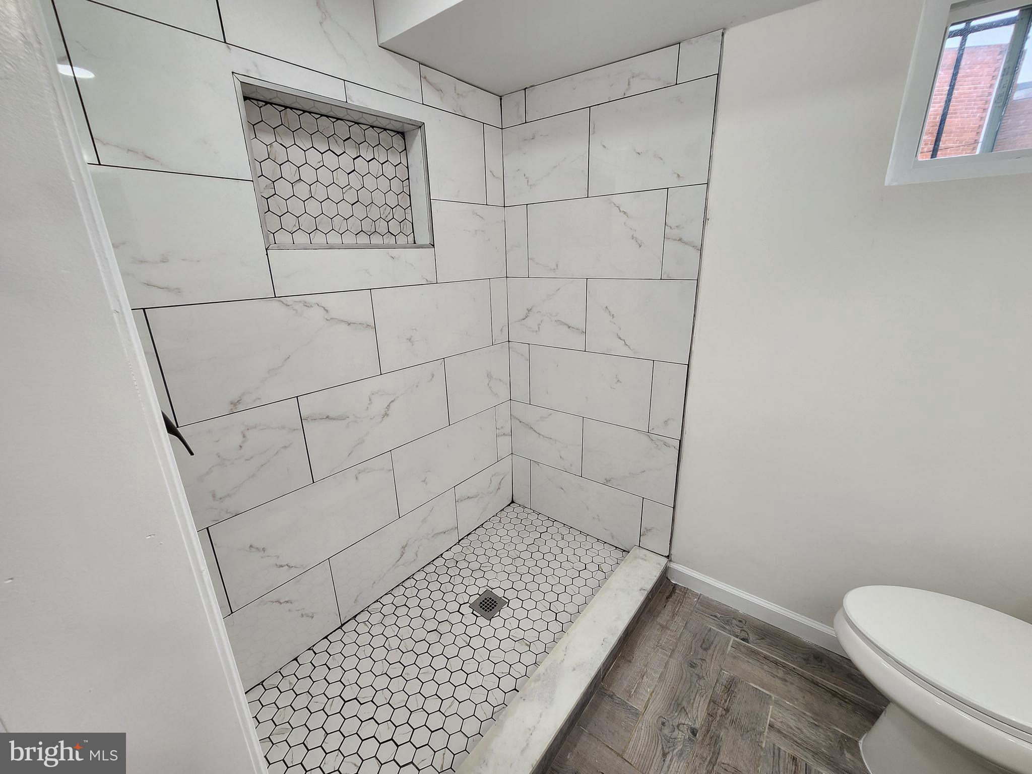 1261 Gallatin Street Northeast Washington, DC 20017 - Photo 42 of 60 a bathroom with a shower