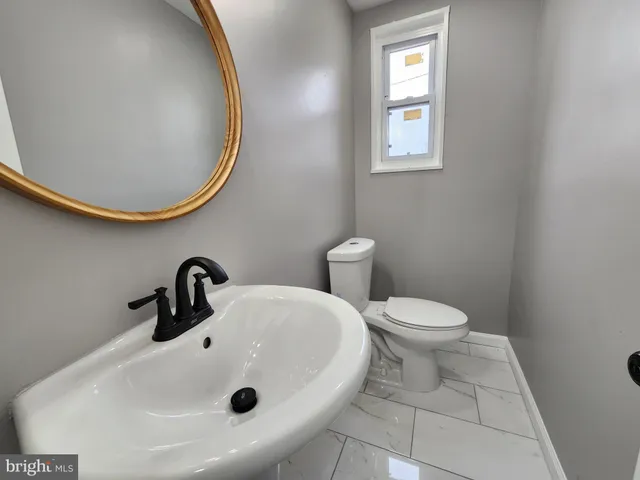 a front view of a house with glass windows