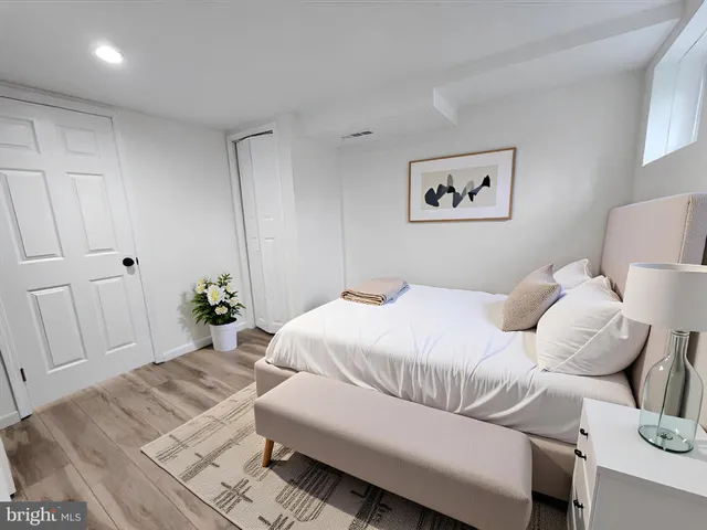 a front view of a house with iron fence