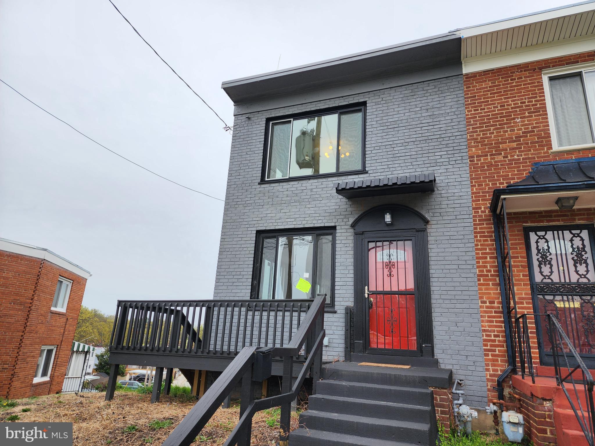 1261 Gallatin Street Northeast Washington, DC 20017 - Photo 48 of 60 a view of front door of house with stairs