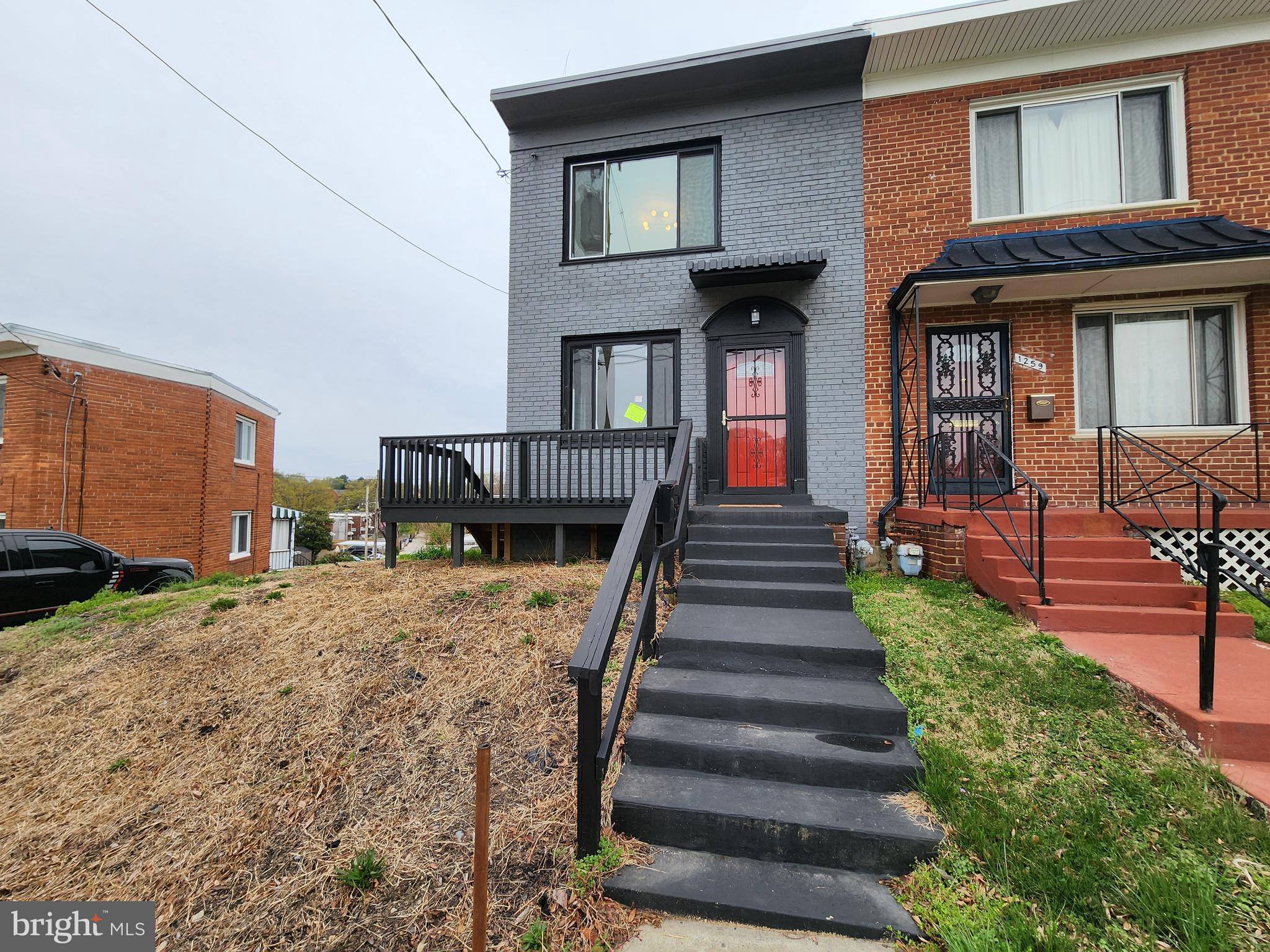 1261 Gallatin Street Northeast Washington, DC 20017 - Photo 49 of 60 a view of a house with a yard balcony
