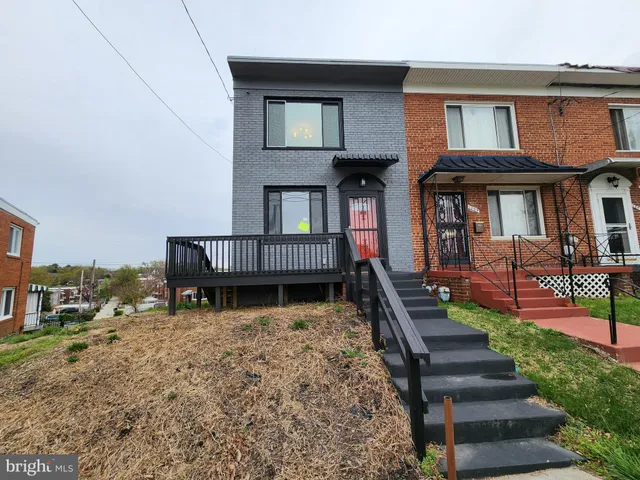 a front view of a building with multiple windows