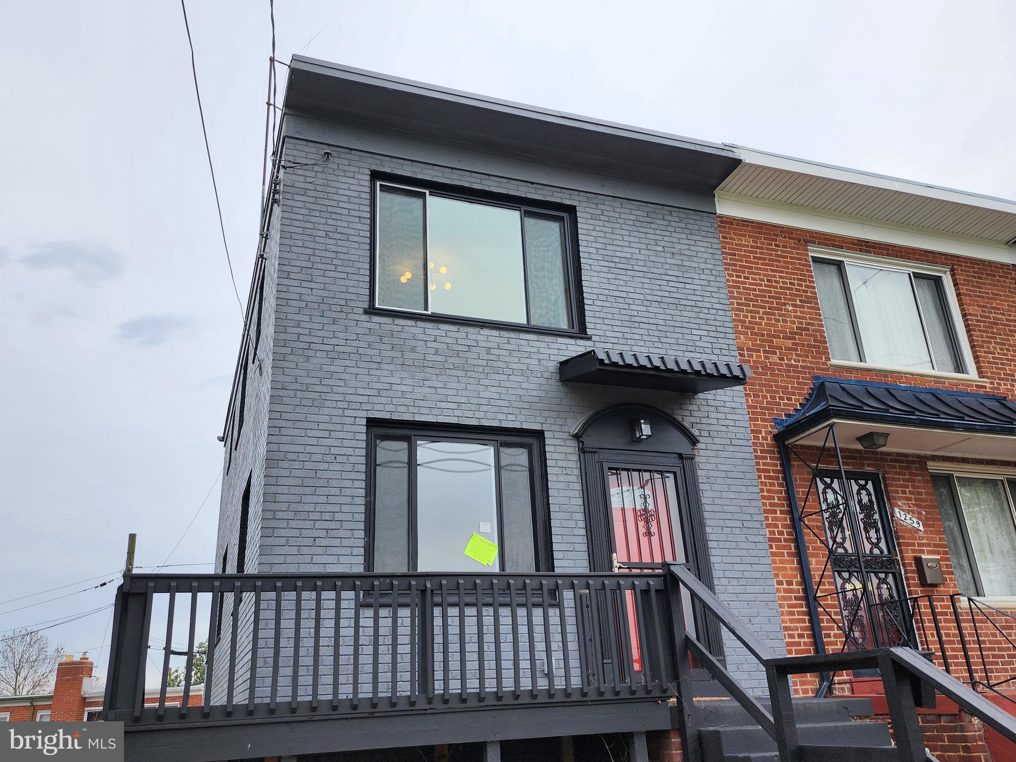 1261 Gallatin Street Northeast Washington, DC 20017 - Photo 51 of 60 a front view of a house with glass windows