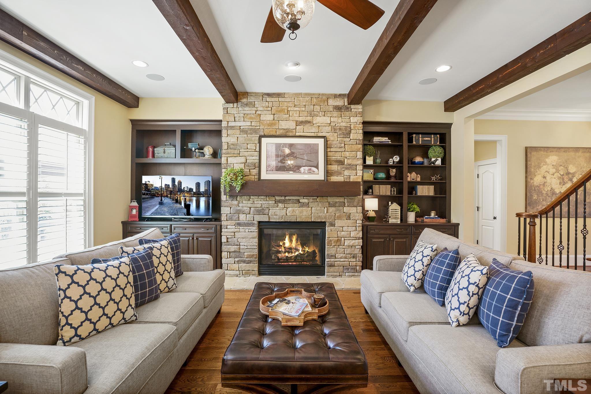 6837 Mactavish Way Raleigh, NC 27613 - Photo 12 of 48 a living room with furniture fireplace and window