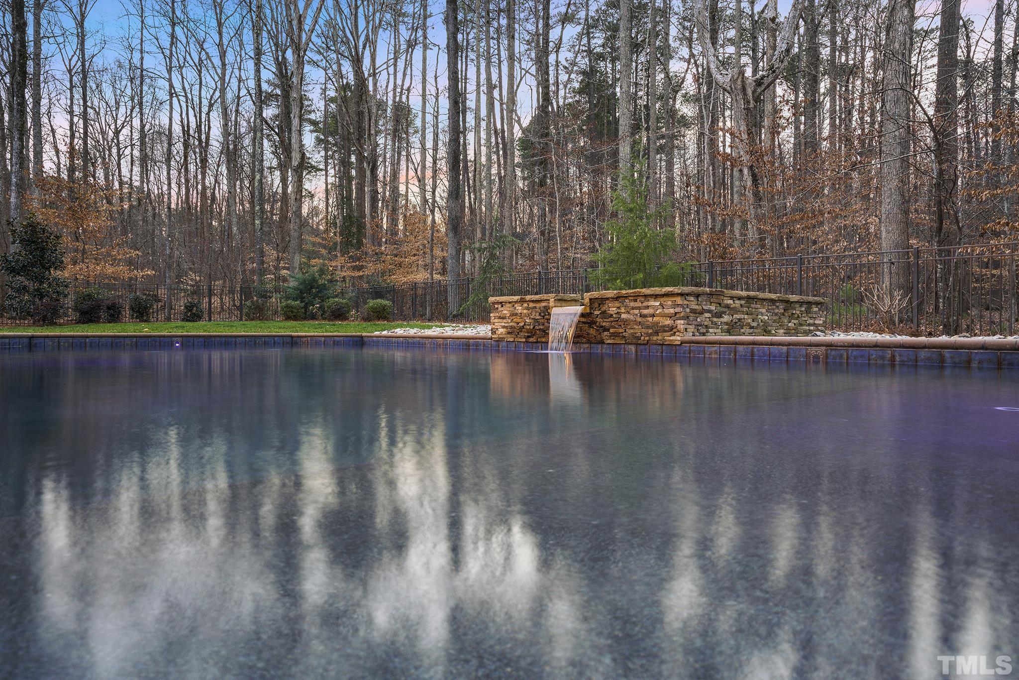 6837 Mactavish Way Raleigh, NC 27613 - Photo 3 of 48 a view of a yard with wooden fence