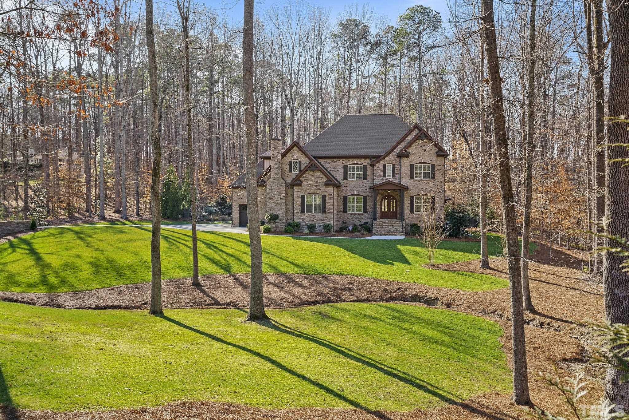 6837 Mactavish Way Raleigh, NC 27613 - Photo 45 of 48 a view of a house with a backyard