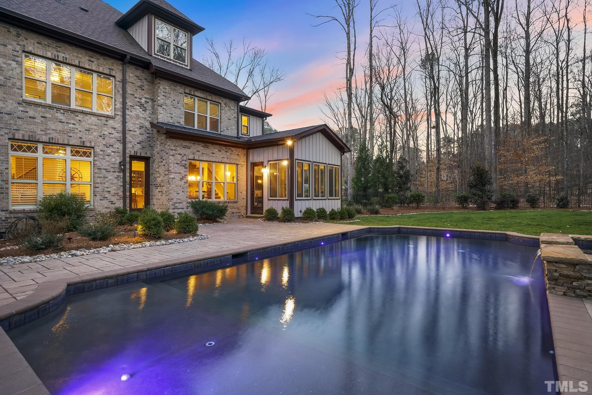 6837 Mactavish Way Raleigh, NC 27613 - Photo 5 of 48 a view of swimming pool with outdoor seating