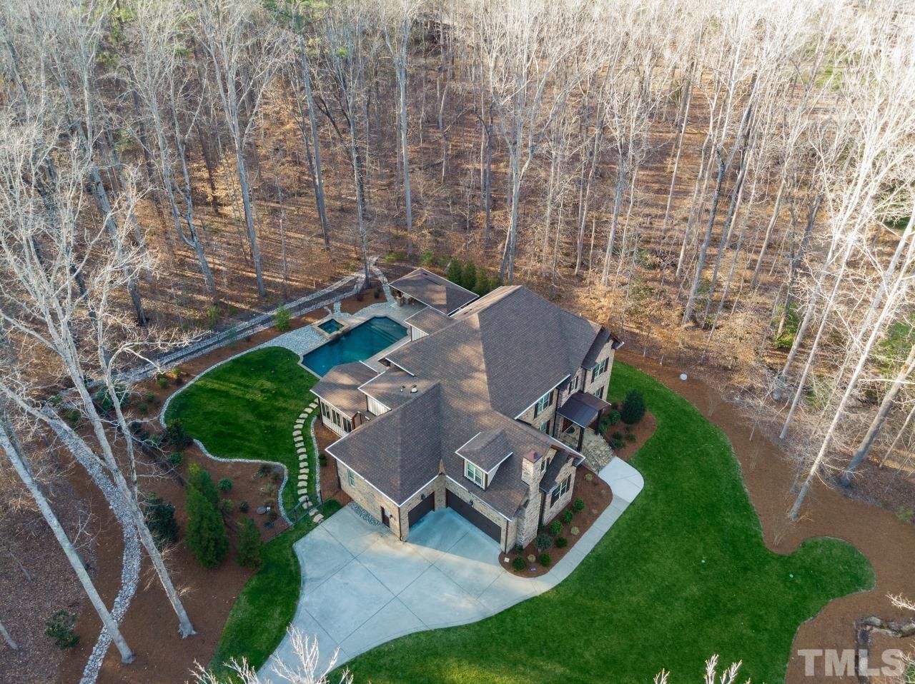 6837 Mactavish Way Raleigh, NC 27613 - Photo 7 of 48 an aerial view of a house with a yard