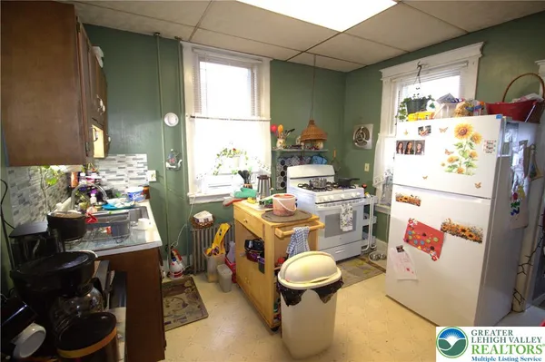 a room with furniture and a window