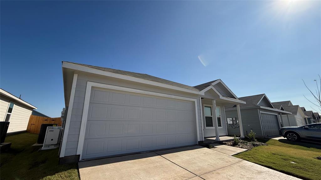 6725 Haines Drive Princeton, TX 75407 - Photo 4 of 25 a view of a car garage