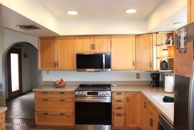 1201 East Old Stewart Road Willcox, AZ 85643 - Photo 8 of 49 a kitchen with granite countertop a sink stainless steel appliances and cabinets