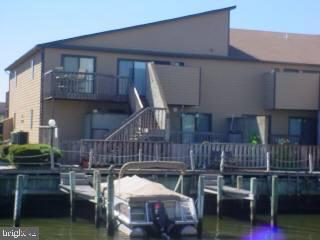 0 Edward Taylor Road, Unit 13 Ocean City, MD 21842 - Photo 1 of 5 a view of deck with patio