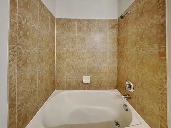 a bathroom with a bathtub