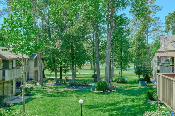 a view of a backyard with garden