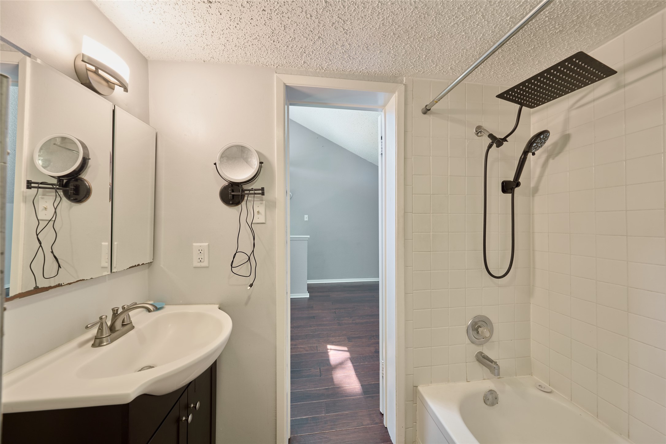 12900 Walden Road, Unit 622F Montgomery, TX 77356 - Photo 24 of 32 a bathroom with a sink a toilet and shower