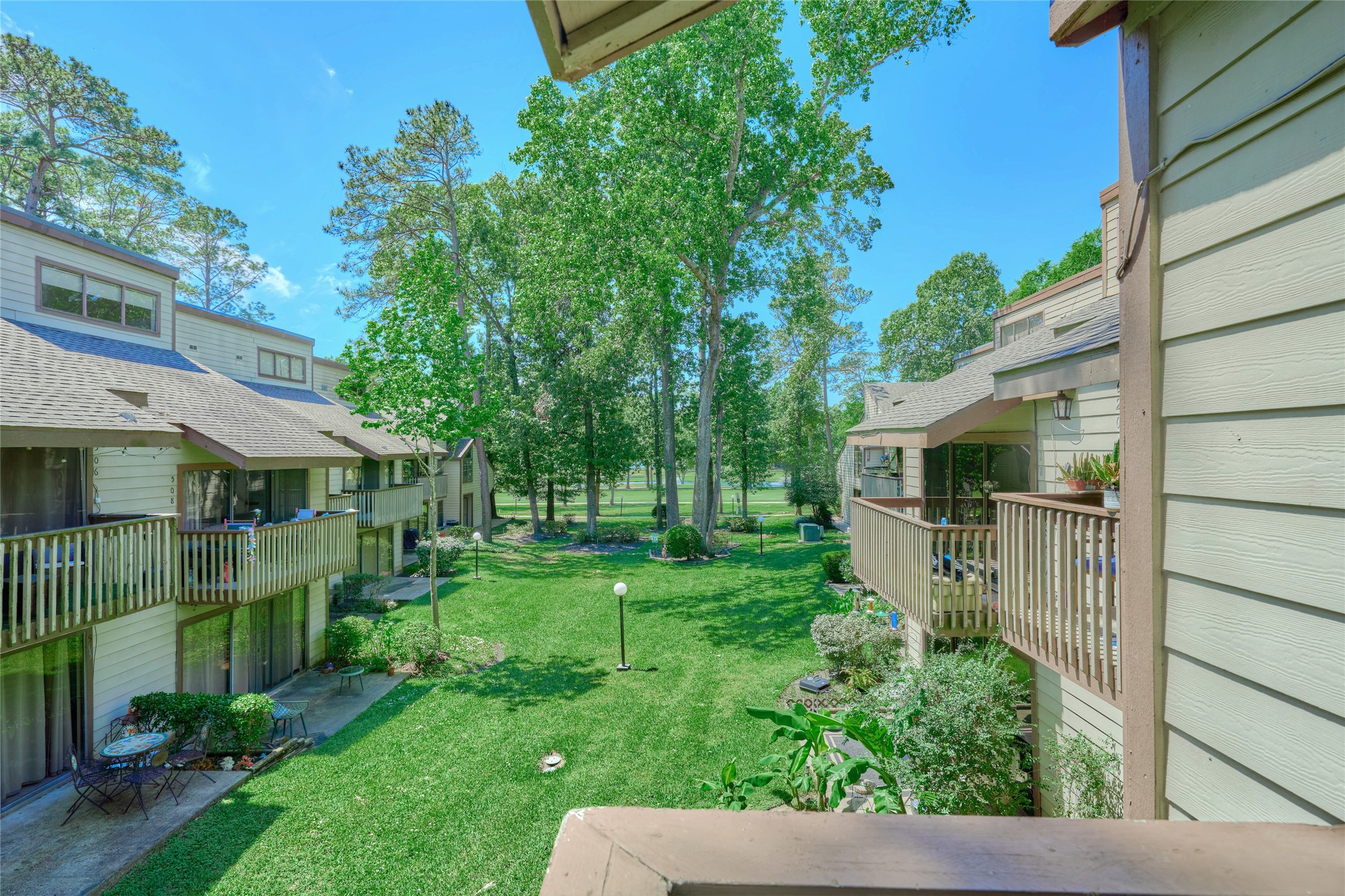 12900 Walden Road, Unit 622F Montgomery, TX 77356 - Photo 29 of 32 front view of a house with a yard