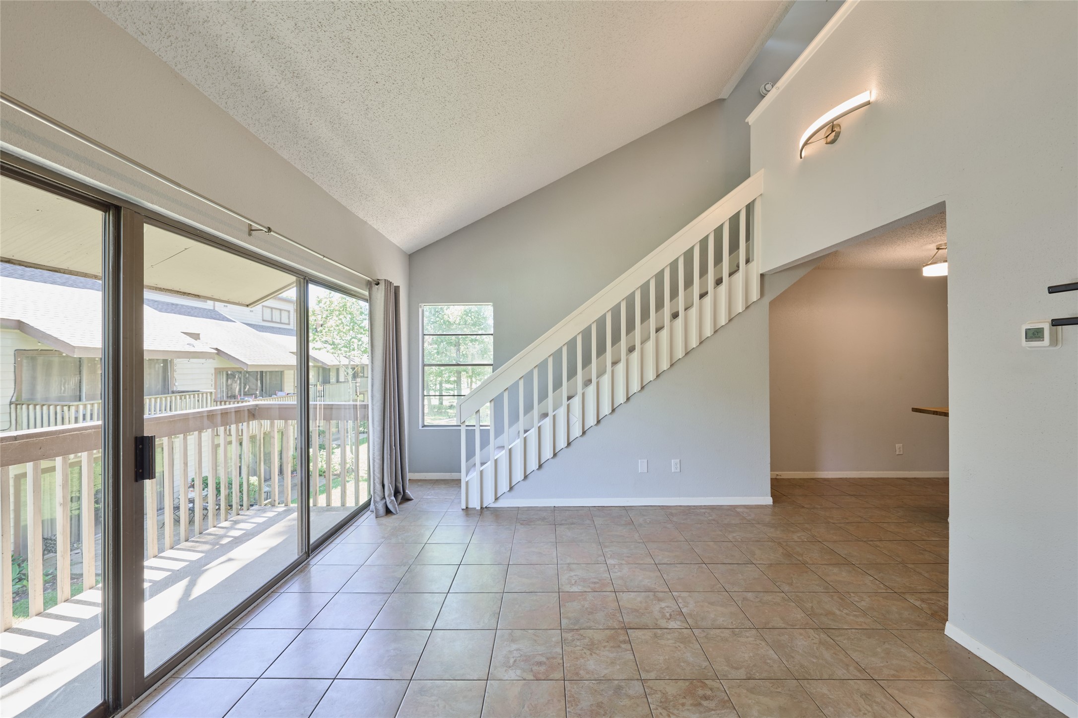 12900 Walden Road, Unit 622F Montgomery, TX 77356 - Photo 8 of 32 a view of entryway with stairs