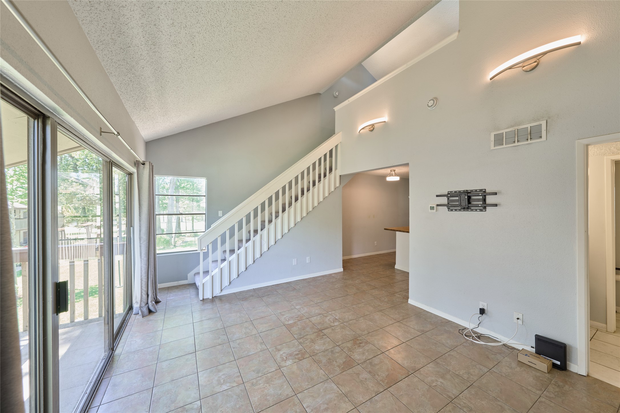 12900 Walden Road, Unit 622F Montgomery, TX 77356 - Photo 9 of 32 a view of an entryway with staircase
