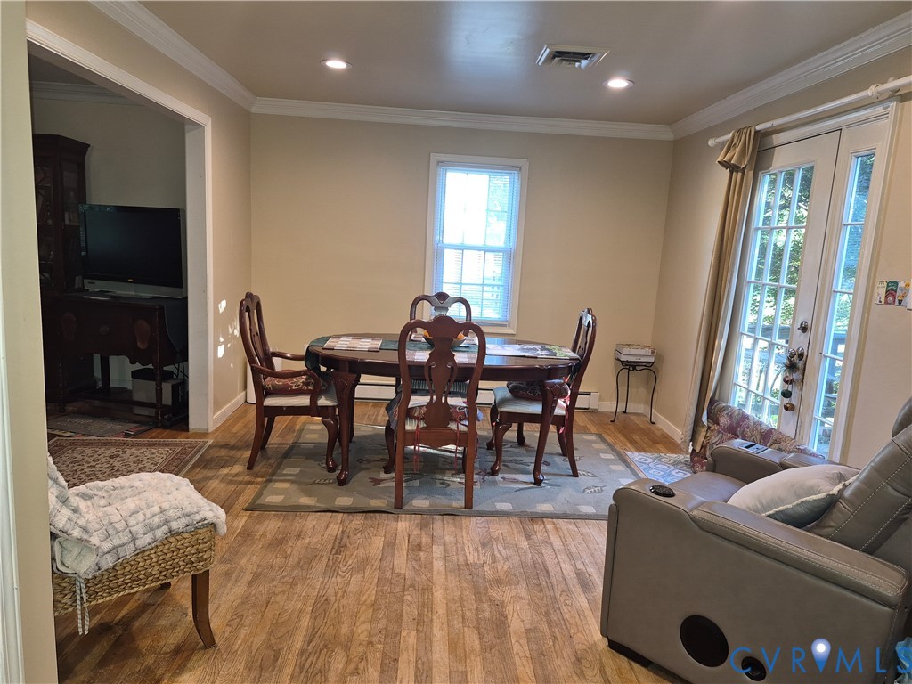 3818 Cedar Grove Road Richmond, VA 23235 - Photo 9 of 20 a view of a dining room with furniture window and outside view