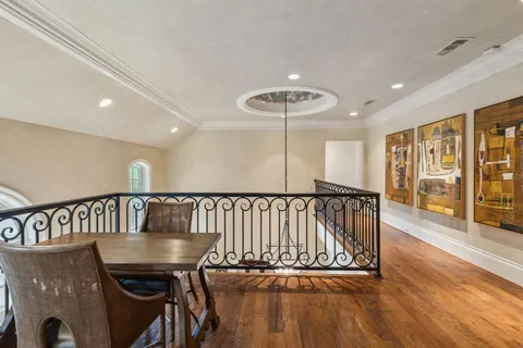 a view of entryway with wooden floor