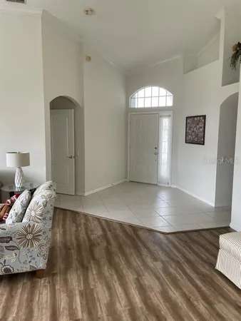 a view of a livingroom with wooden floor